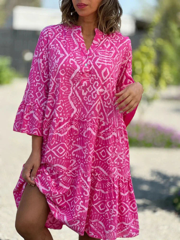 Casual losvallende dames midi-jurk met speelse print en gelaagde details, stijlvol.