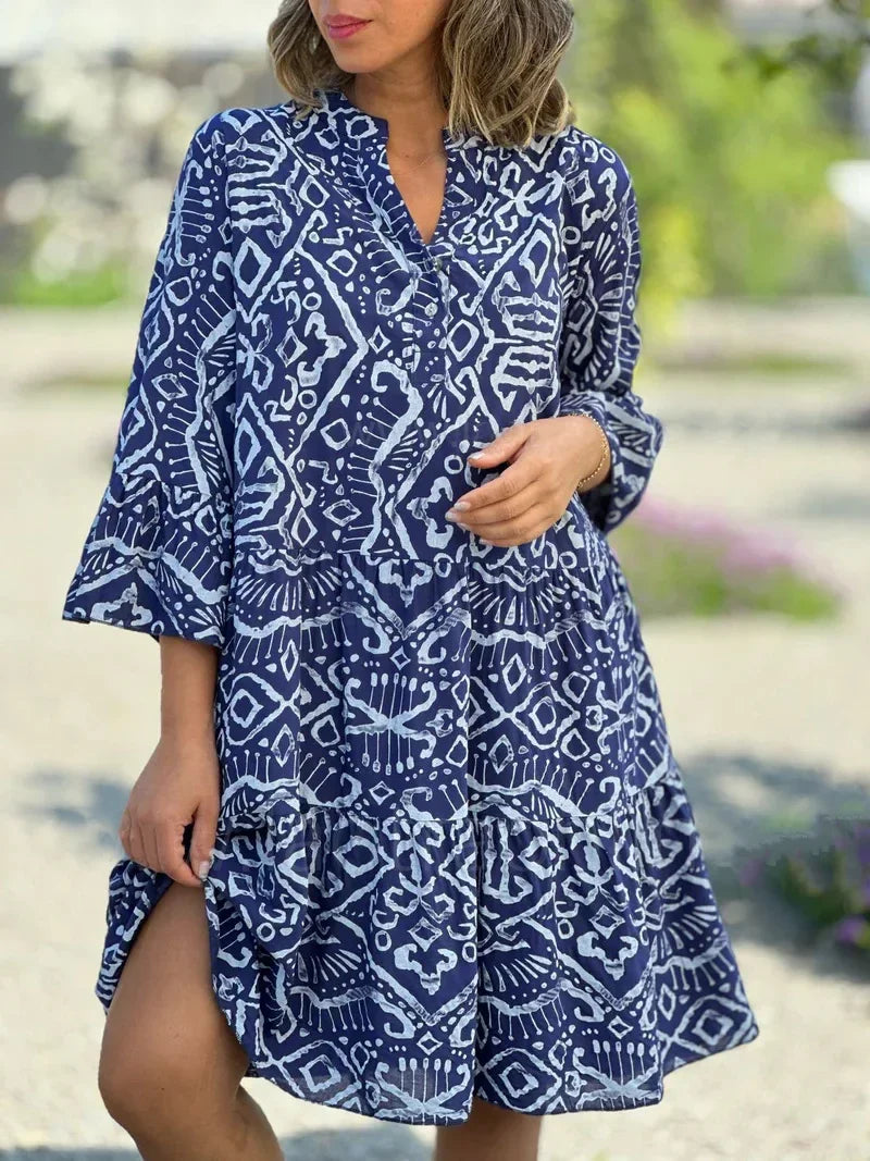 Trendy dames midi-jurk met unieke print, gelaagd design en 3/4 mouw, casual chic.