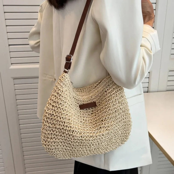Chique bohemian dames schoudertas/crossbody tas met veilige ritssluiting en gevlochten design.