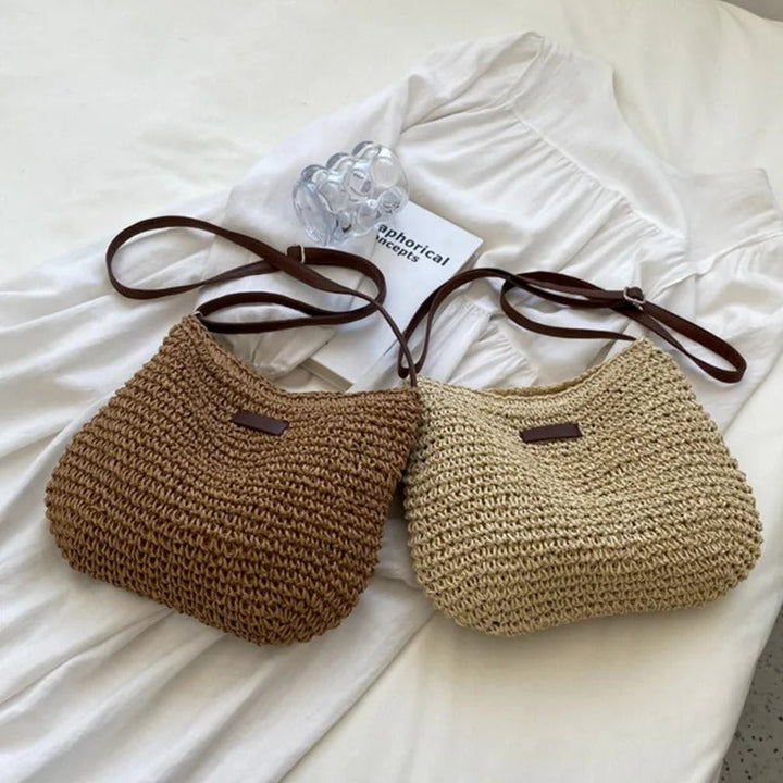 Stijlvolle dames crossbody tas met gevlochten look, perfect als zomertas en makkelijk verstelbaar.