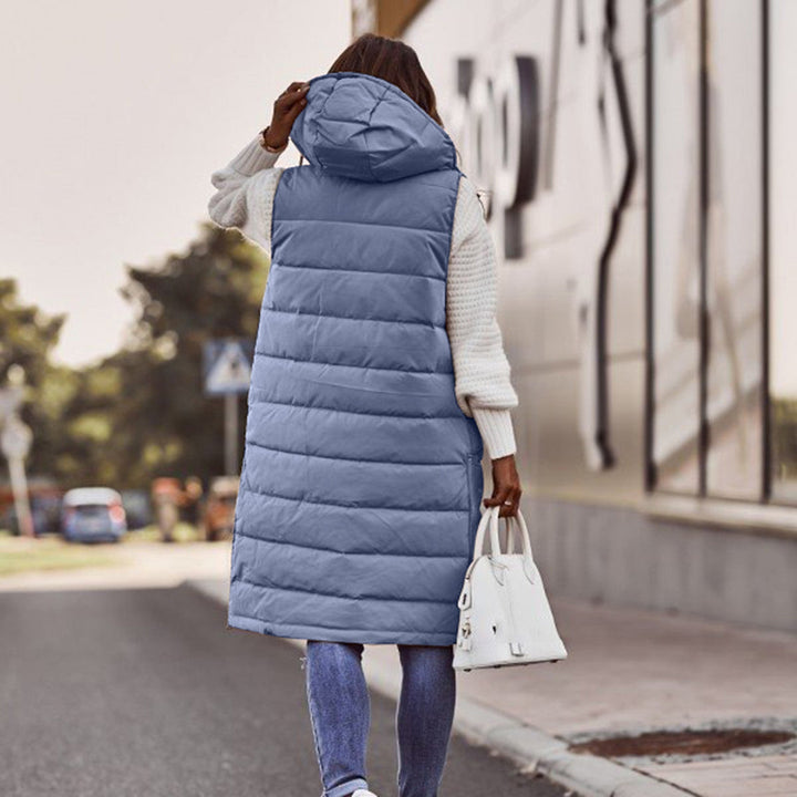 Dames warm mouwloos vest met capuchon, perfect als stijlvolle bodywarmer voor winterse dagen.