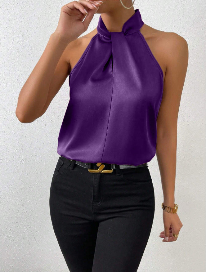 Dames haltertop met gedraaide hals, compleet voor een stijlvolle zomerse look.