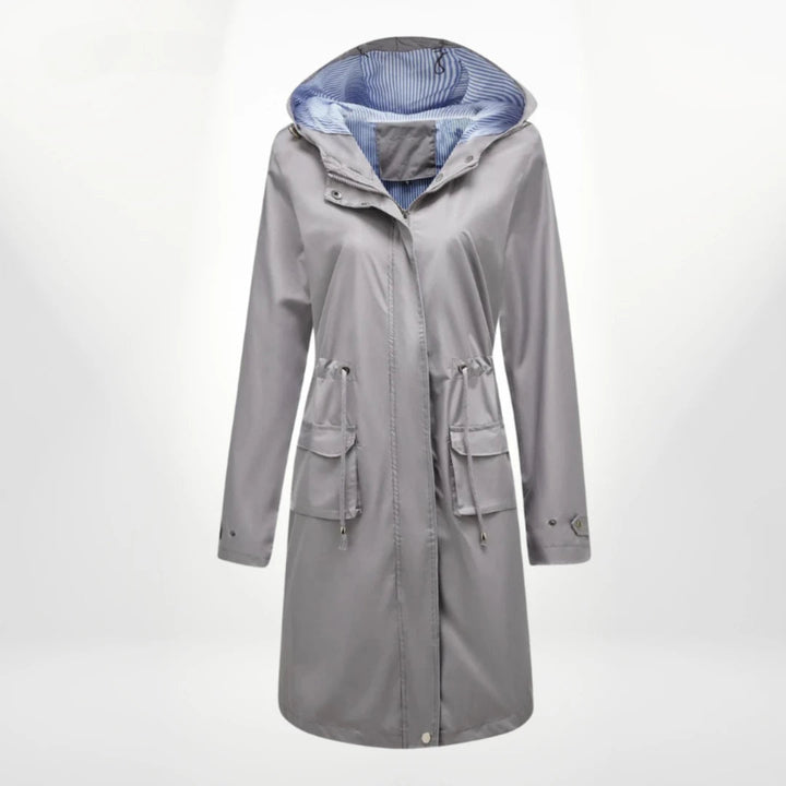 Robuuste dames outdoor anorak jas met capuchon, lange windjack perfect voor wandelingen en avonturen.