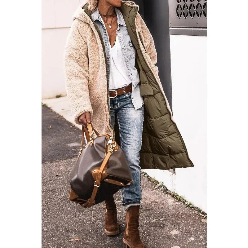 Comfortabele lange winterjas voor dames met capuchon. Perfecte warme pufferjas voor koude dagen.