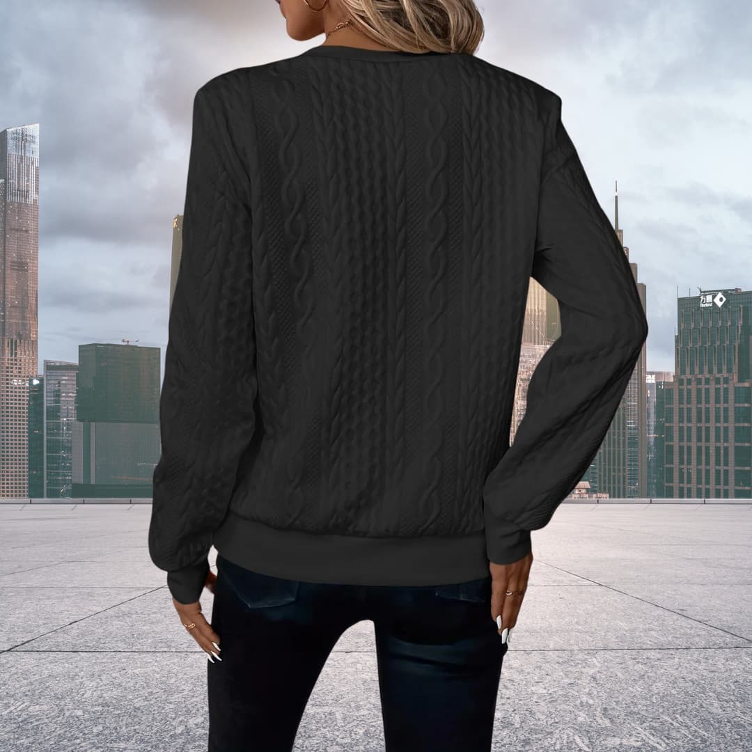 Comfortabel dames vest met een elegante kabelbrei en handige rits. Perfect voor een warme, modieuze look.