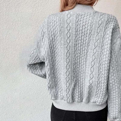 "Dames kabelgebreid vest met V-hals en knopen, tijdloos en elegant, casual pasvorm, comfortabele en stijlvolle cardigan."