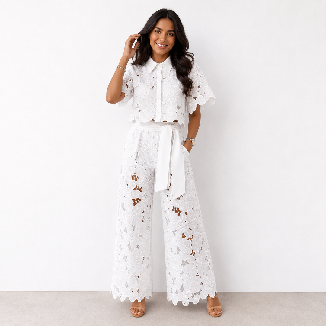 Comfortabele dames wijde broek met bloemenprint en bijpassende crop top, voor een vloeiend silhouet.