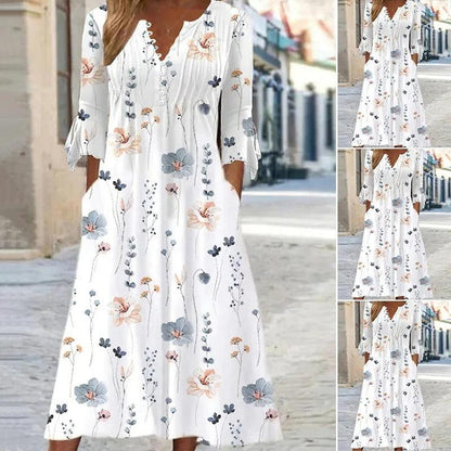 Dames midi jurk met elegante bloemenprint, flatterende pasvorm en vrouwelijke stijl, ideaal voor speciale gelegenheden.