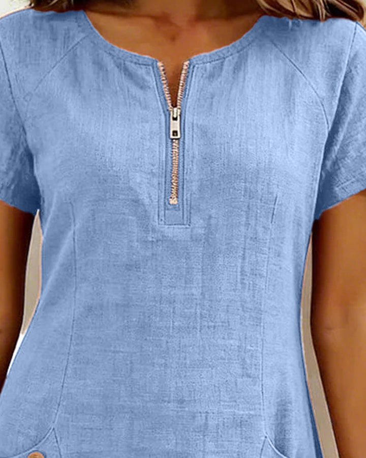 Veelzijdige damesjurk: mini lengte, korte mouw, ronde hals, A-lijn & ritsdetail. Casual comfort.