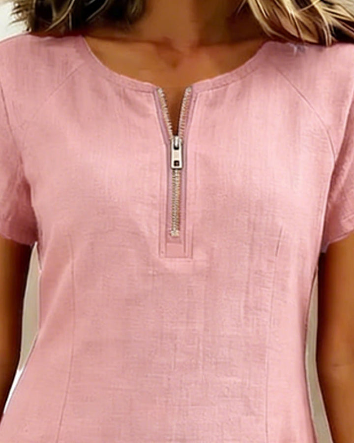Moderne dames mini jurk met korte mouw, ronde hals, A-lijn pasvorm en ritsdetails.