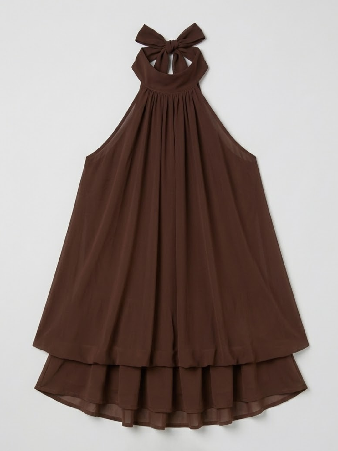 Dames swing jurk met halternek, mini lengte en speelse ruches. Vrolijk en vrouwelijk.