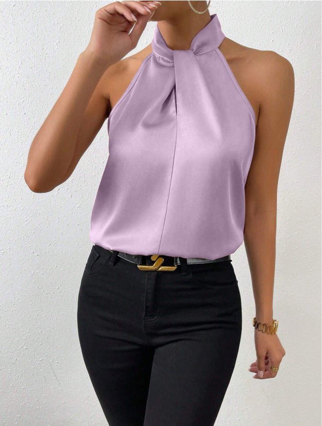 Luchtige dames haltertop met geknoopte hals; vloeiend en comfortabel voor hete zomerdagen en avonden.