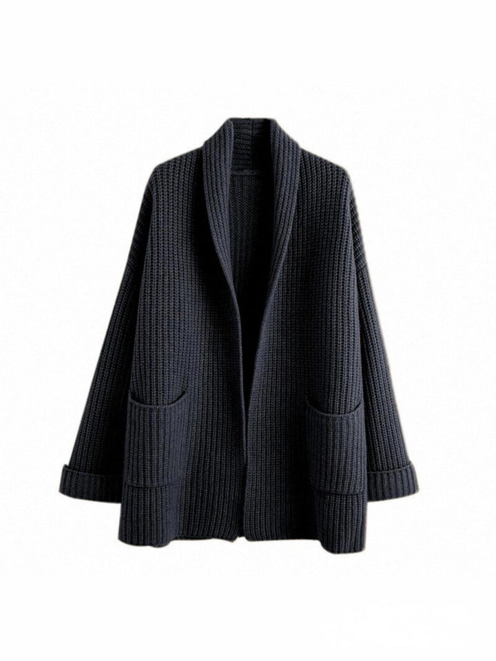 Abrikoos lange dames cardigan, comfortabel open vest. Stijlvolle en zachte dameskleding voor elke dag.
