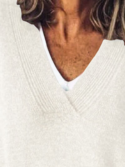 Elegante dames trui met V-hals, oversized pasvorm, ideaal voor een relaxte stijlvolle look.