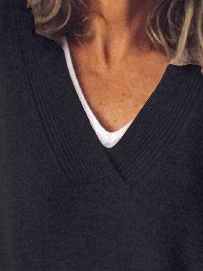 Veelzijdige dames oversized trui met V-hals, combineerbaar voor diverse casual looks.