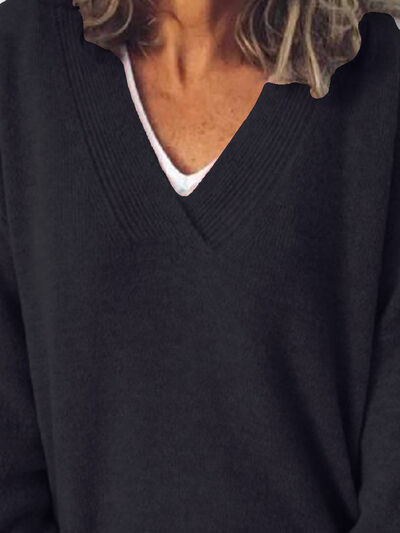 Zachte dames oversized V-hals trui, warm en comfortabel voor herfst en winter.