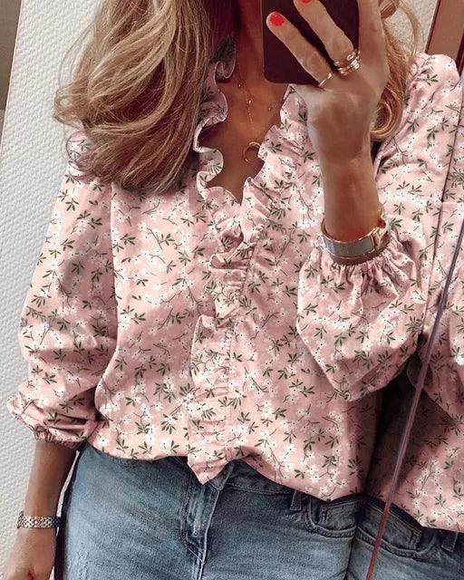 Elegante dames V-hals blouse met ruches en lange mouwen, perfect voor kantoor of casual chic look.