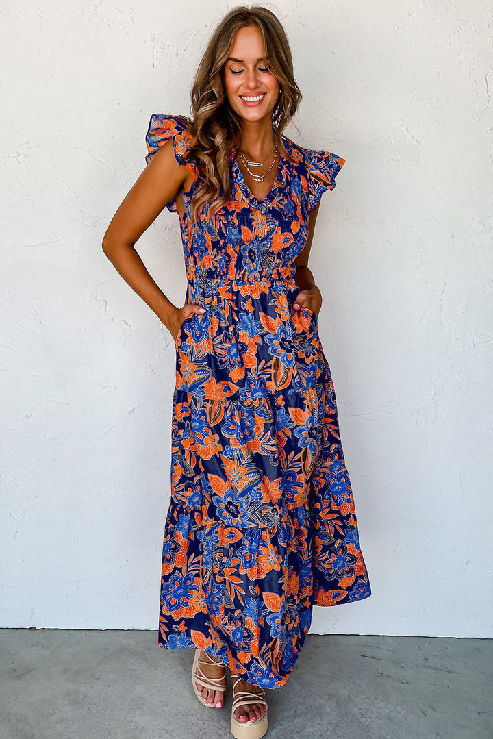 Comfortabele bloemenprint maxi jurk voor dames, met smocked detail en V-hals. Een zwierige zomerjurk.