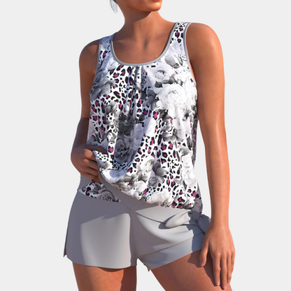 "Dames tankini badpak met kleurrijke print en draadloze beka, met bijpassende play shorts voor comfort en stijl."