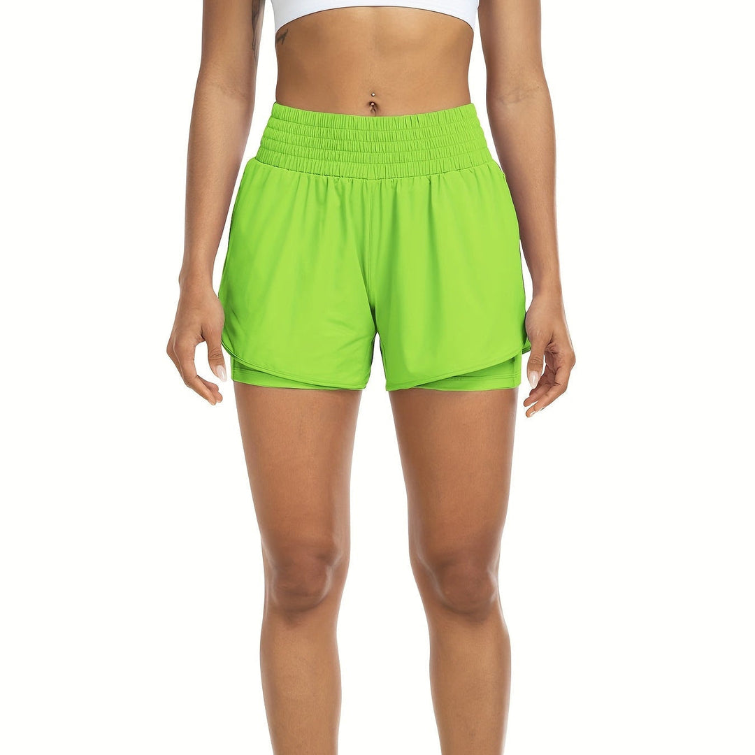 Veelzijdige dames yogashort met hoge taille, sneldrogend en rekbaar voor diverse sporten.