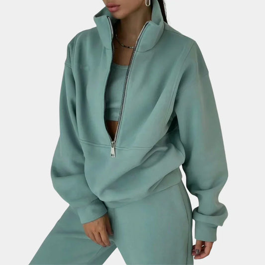 "Dames tweedelig trainingspak: elegante sweater, hoge taille broek, comfortabele pasvorm, ideaal voor casual stijl."