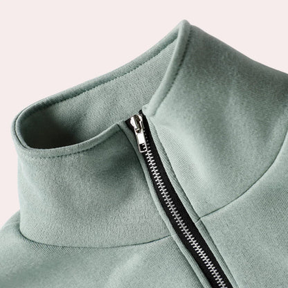 "Dames tweedelig trainingspak: elegante sweater, hoge taille broek, comfortabele pasvorm, ideaal voor casual stijl."