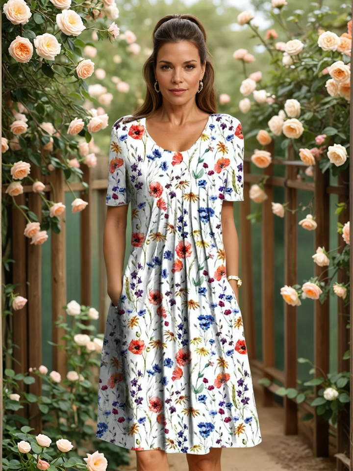 Elegante dames A-lijn midi-jurk met V-hals, bloemenprint en korte mouwen. Perfect voor zomerse dagen.