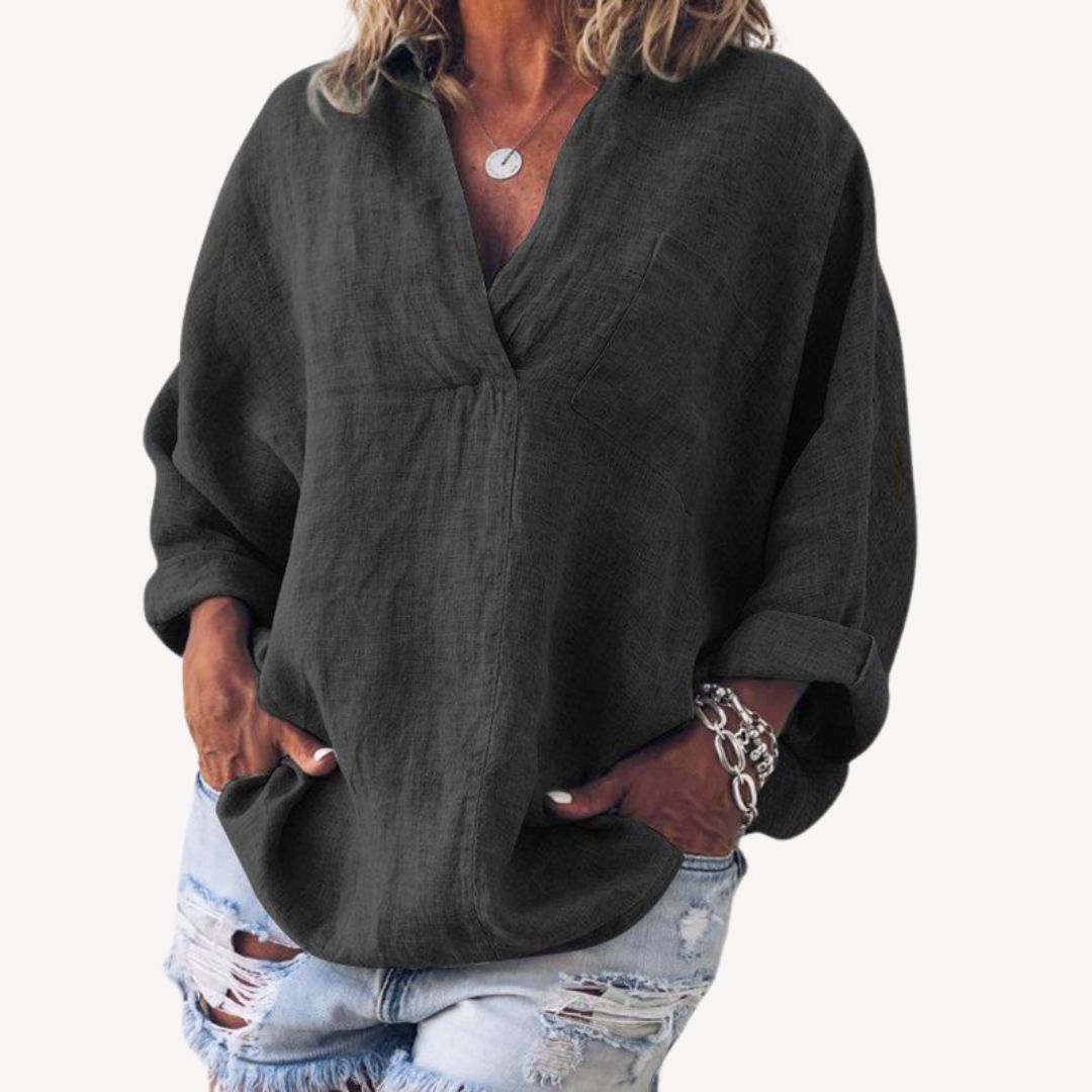 Elegante dames V-hals blouse met oprolbare mouwen, ideaal voor lentemode en zomerstijl. Comfortabel en veelzijdig.