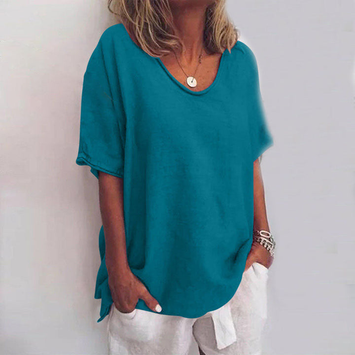 Casual dames V-hals oversized T-shirt met losse pasvorm. Een veelzijdige en comfortabele top voor lente en zomer.