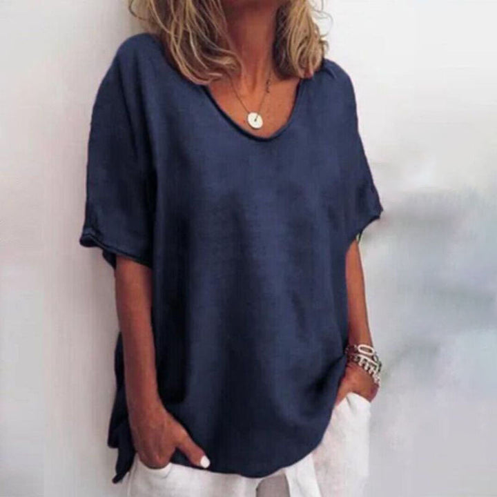 Eenvoudig en comfortabel dames V-hals T-shirt. Dit oversized basic topje is ideaal voor de zomer, met een losse pasvorm.