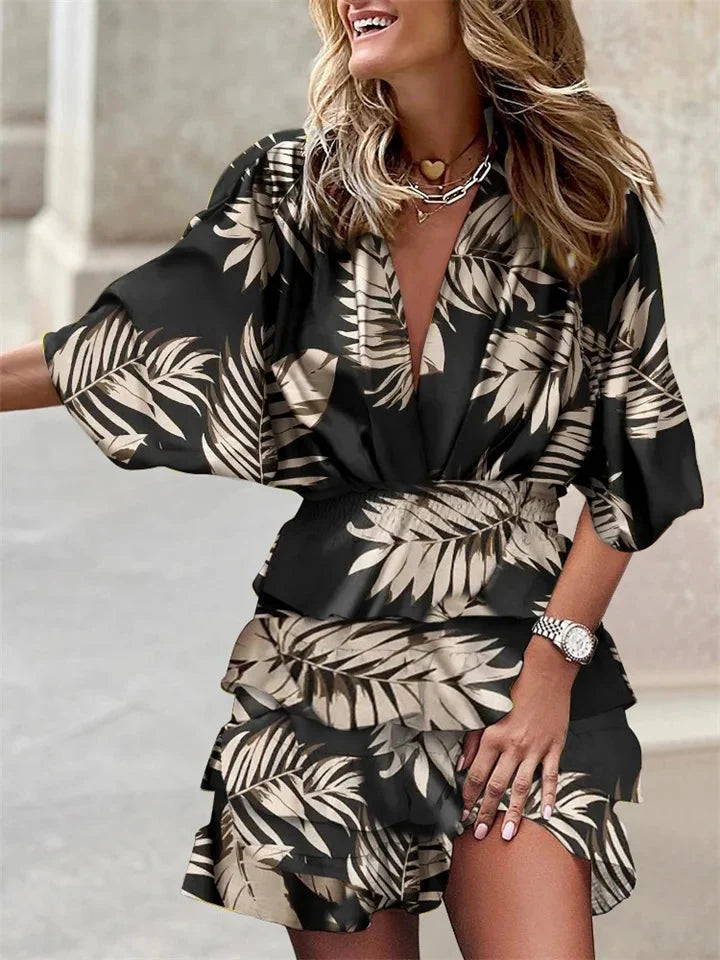 Comfortabele zomerjurk voor dames met V-hals, ruches en korte mouw. Trendy en luchtig voor de zomer.