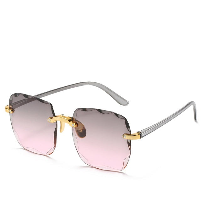 "Dames zonnebril - UV400 bescherming, stijlvol design in roze, grijs/roze en bruin/grijs met licht montuur"