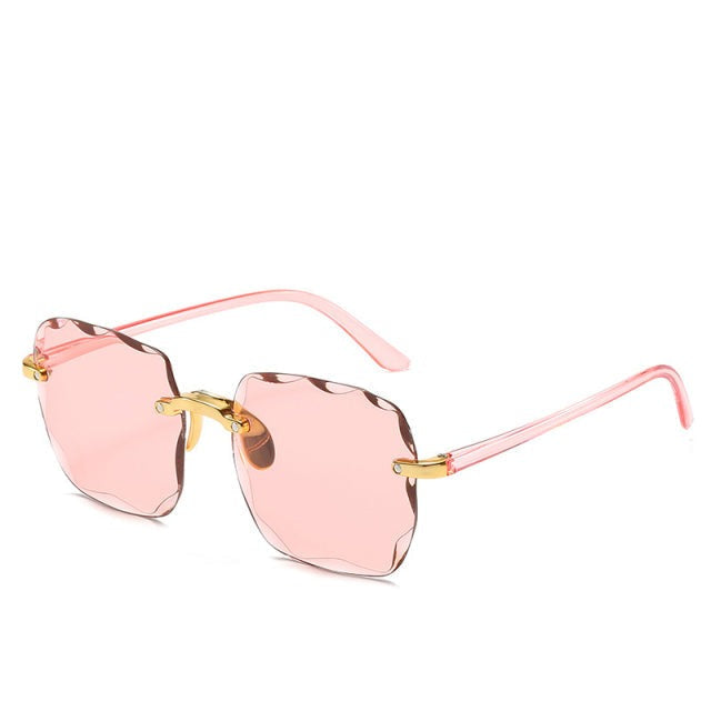 "Dames zonnebril - UV400 bescherming, stijlvol design in roze, grijs/roze en bruin/grijs met licht montuur"