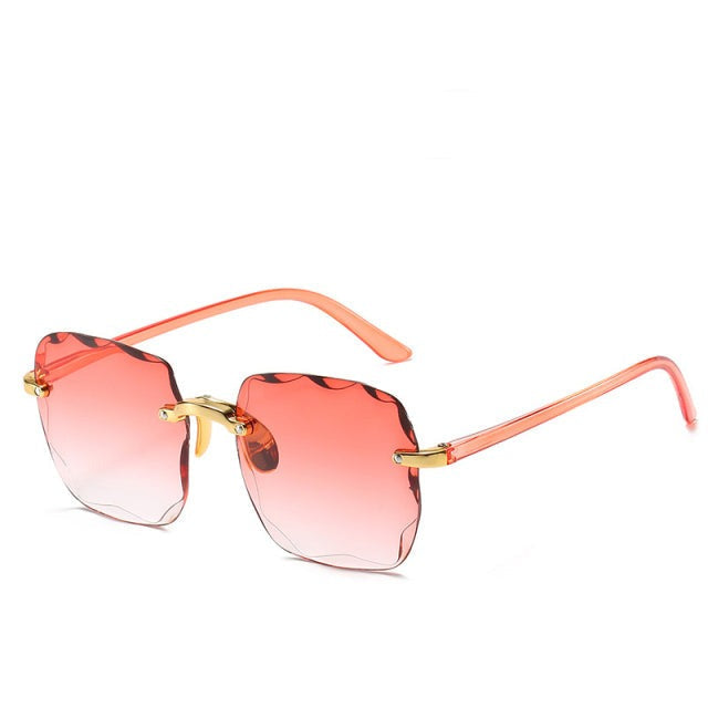 "Dames zonnebril - UV400 bescherming, stijlvol design in roze, grijs/roze en bruin/grijs met licht montuur"