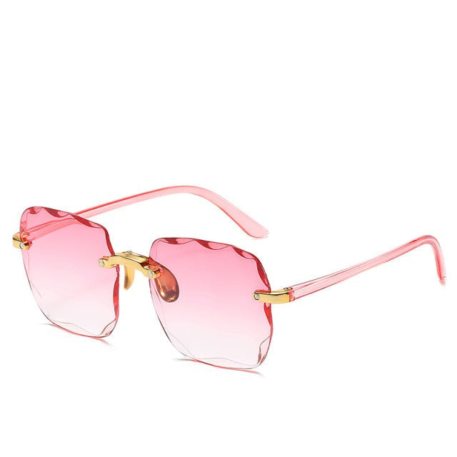 "Dames zonnebril - UV400 bescherming, stijlvol design in roze, grijs/roze en bruin/grijs met licht montuur"