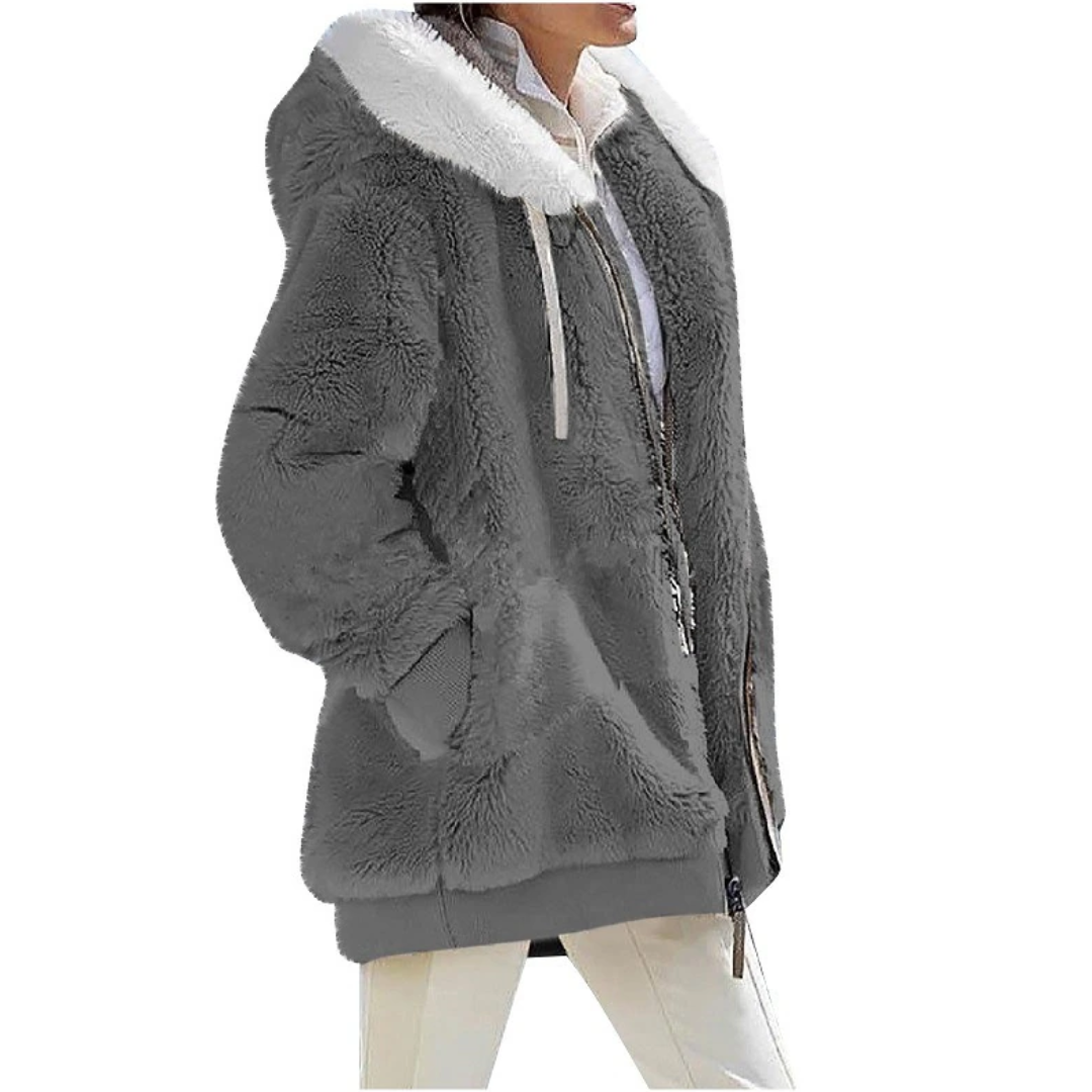 Extra warm kasjmierfleece damesvest met capuchon, perfect voor koude dagen, comfortabele bovenkleding.