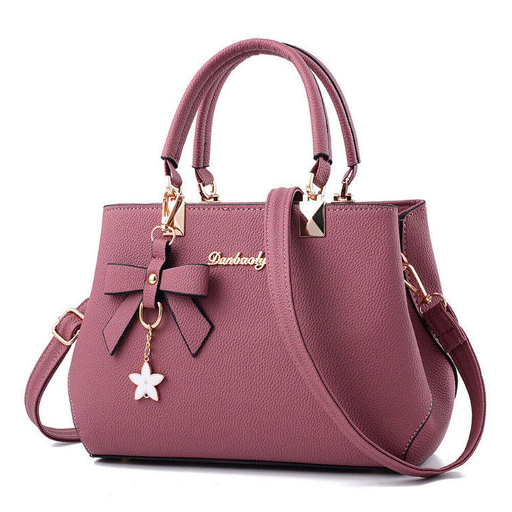Roze dames crossbody tas van kunstleer met strik, charmant en veelzijdig, ideaal als handtas.