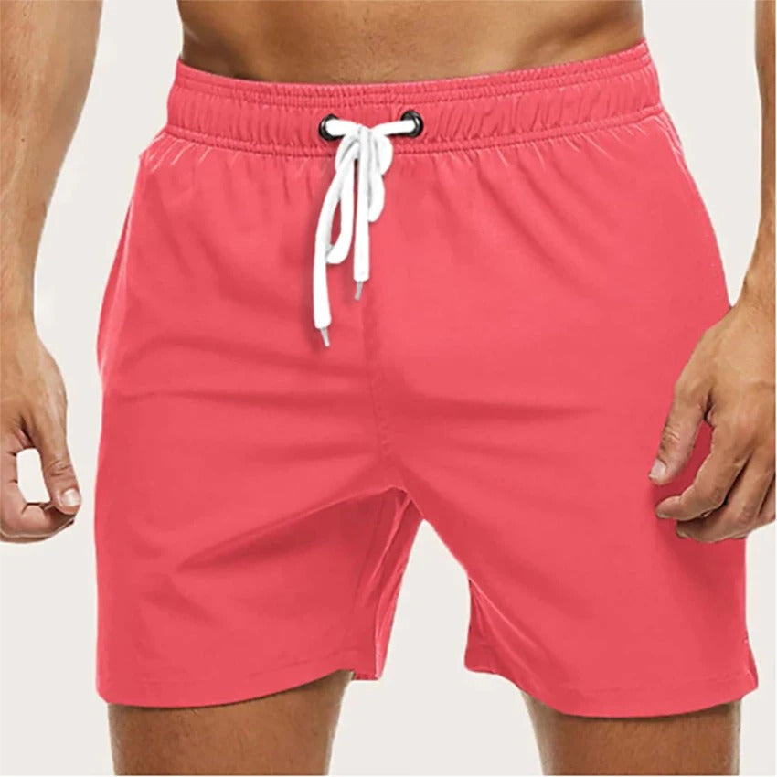 Heren sneldrogende zwembroek met elastische taille, ideaal voor strand en zwembad. Comfortabele pasvorm, perfect voor de zomer.