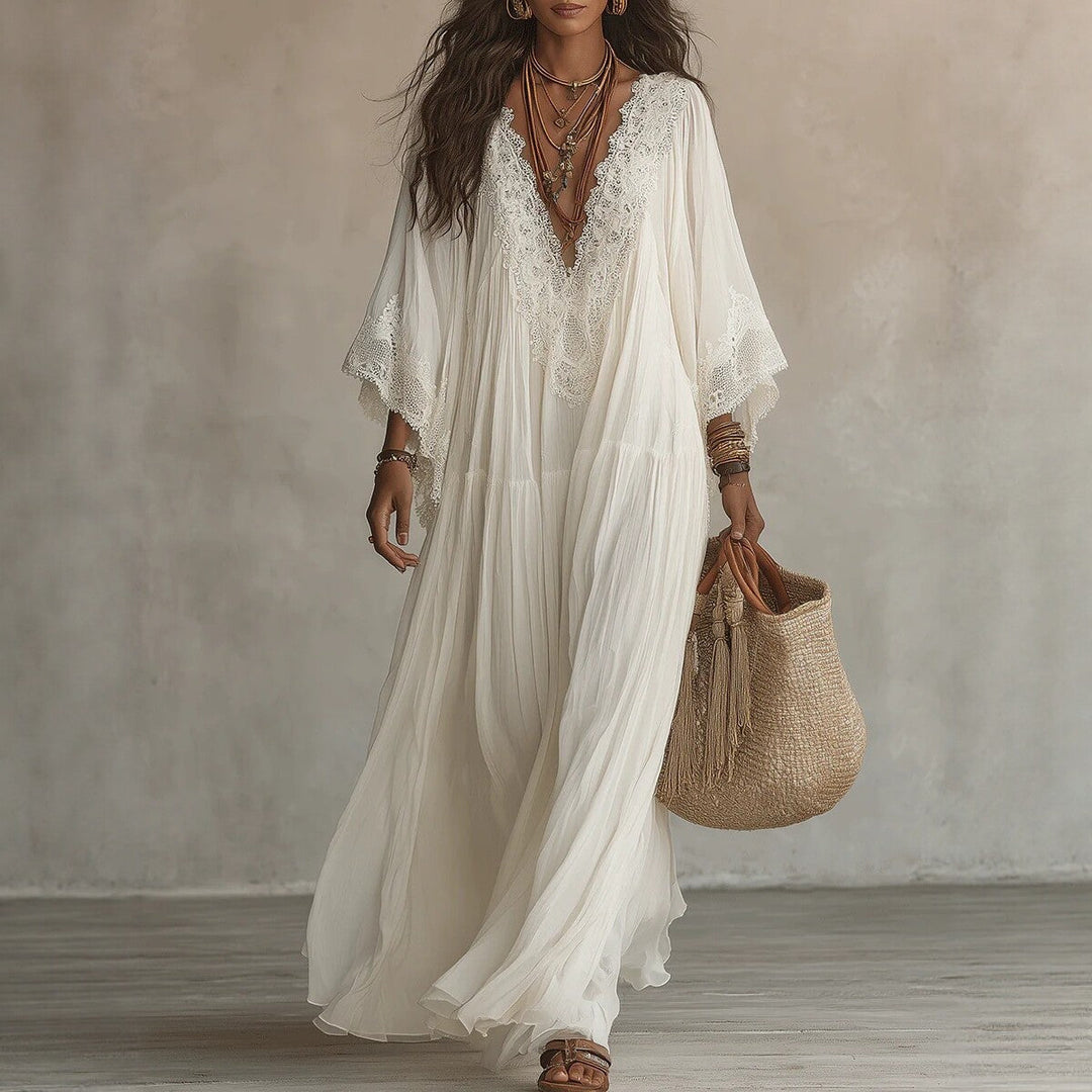 Elegante dames boho maxi-jurk met kanten V-hals en vleermuismouwen, perfect voor zomerse dagen of feestjes.