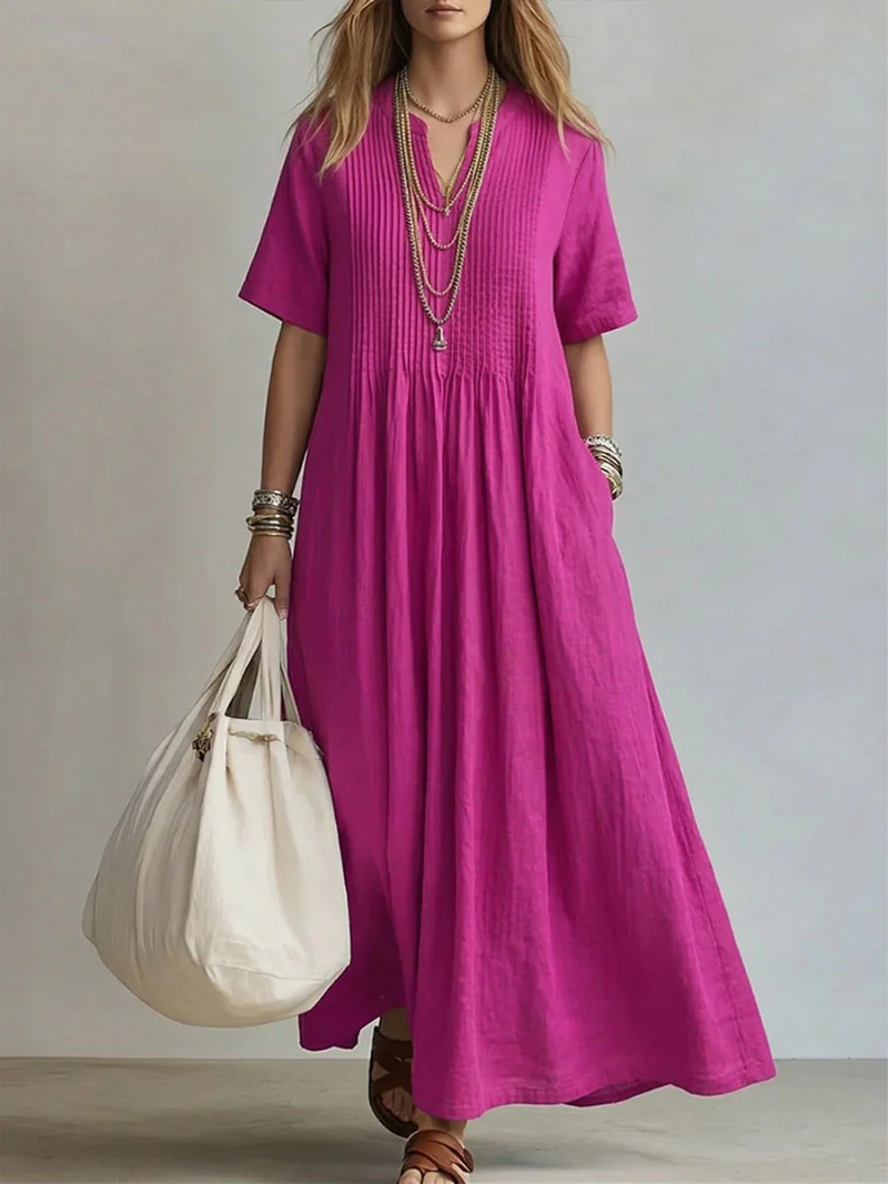 Elegante luchtige dames maxijurk met V-hals, perfect voor zomerse dagen. Comfortabel en stijlvol.