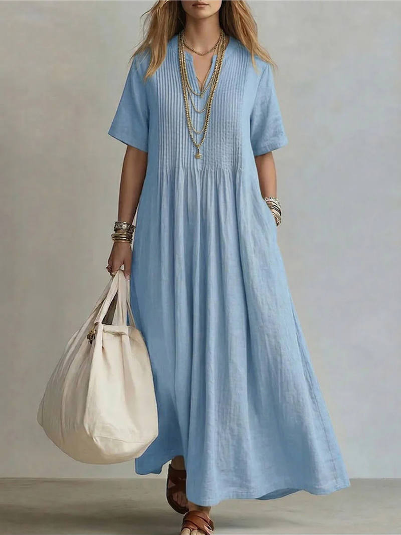 Kleurrijke elegante maxijurk voor dames, met losvallende pasvorm en trendy V-hals voor een zomerse look.