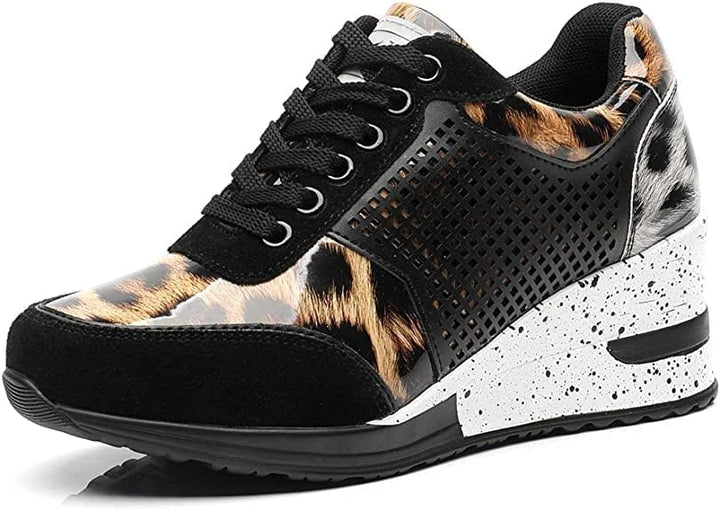 Verhoogde dames sleehak sneakers met comfortabele plateauzool, trendy en stijlvol voor elke casual gelegenheid.