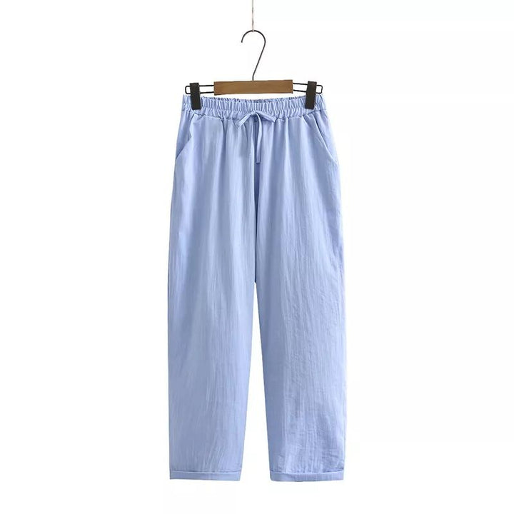 Lente/zomer dames kledingset: luchtige blouse en comfortabele broek voor stijlvolle, casual mode.