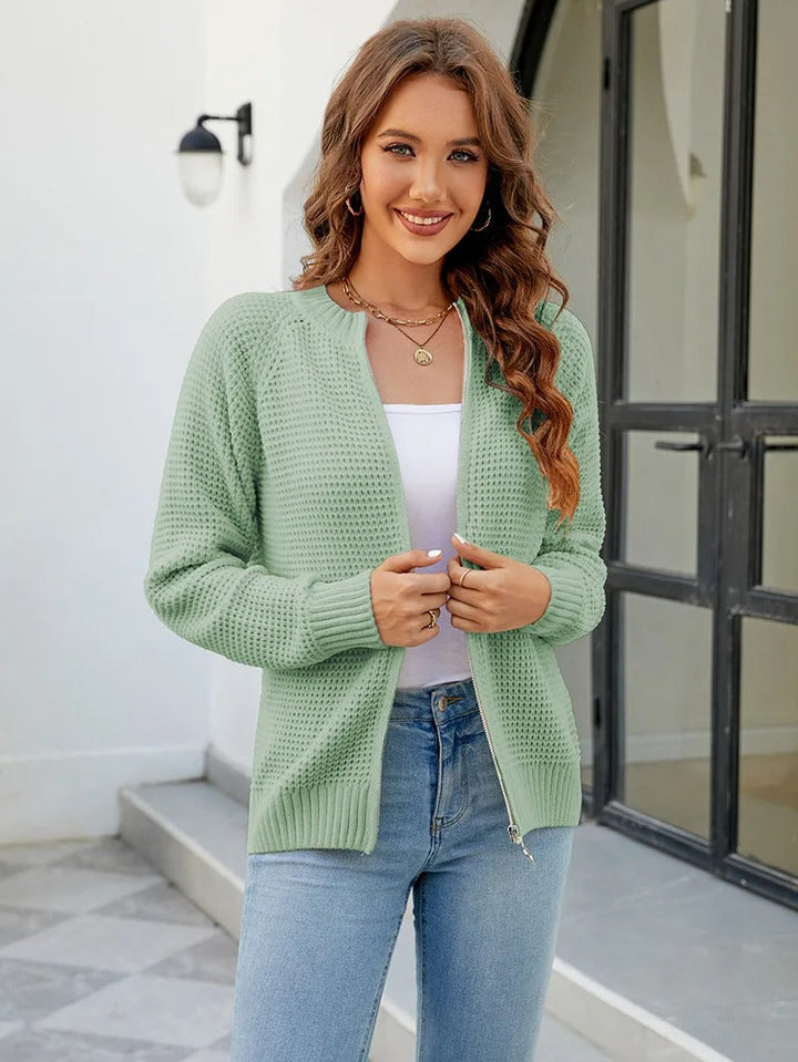 Damesvest met rits, lange mouwen, effen design, perfect voor een comfortabele look.