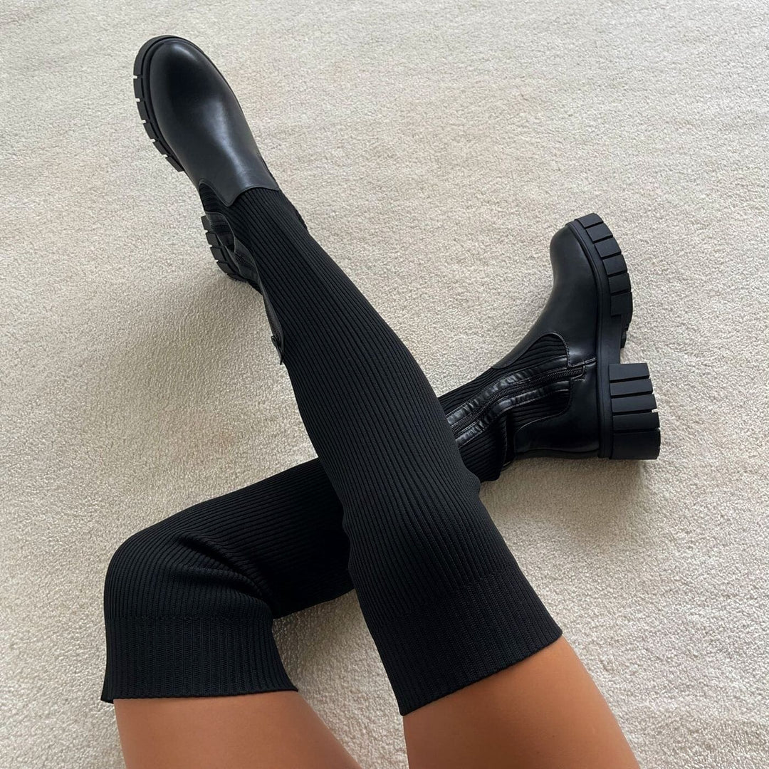 Dames comfortabele zwarte stretch laarzen. Stijlvolle en flexibele winterschoenen voor elke gelegenheid.