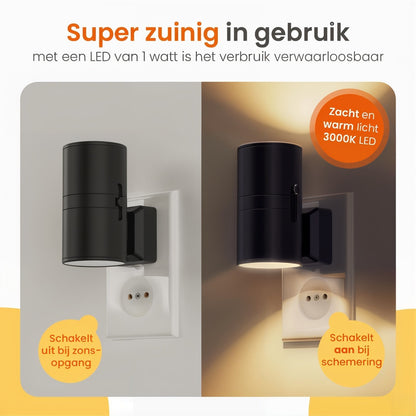 "Dimbare LED nachtlamp, zwart/wit, elegant design met dag-nachtsensor. Past in elk stopcontact voor warme, rustgevende gloed.