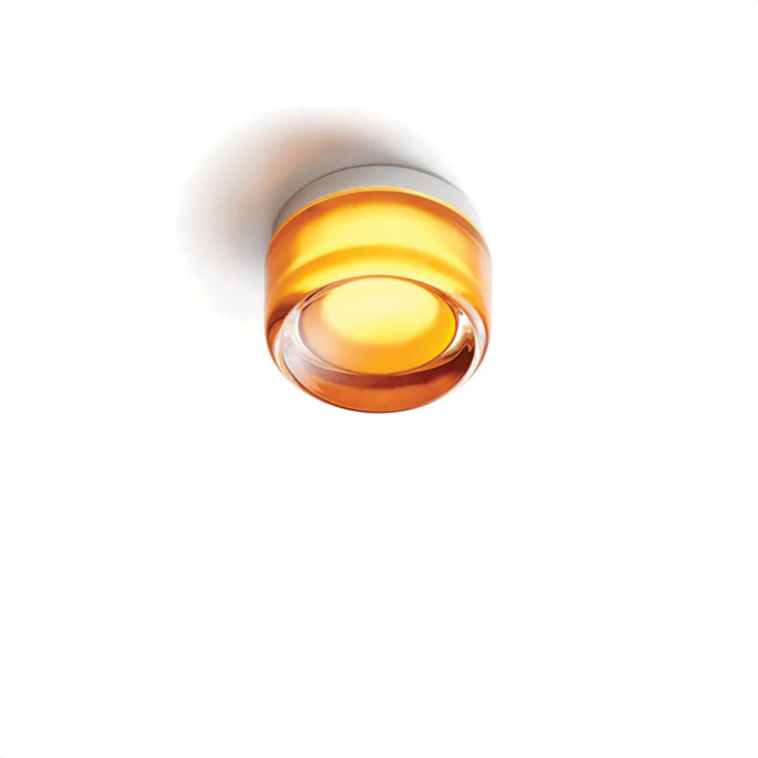 Rookkleurige, energiezuinige LED wandlamp met chique kuiltjestextuur voor stijlvolle interieurverlichting.