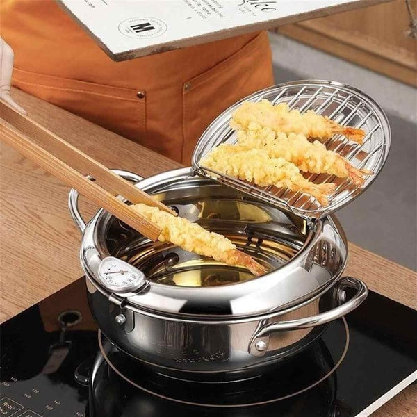 Roestvrijstalen friteuse met ingebouwde thermometer voor perfect frituren van friet, oliebollen en snacks.