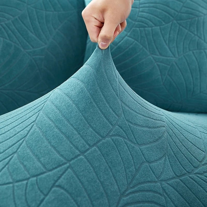 Deze stijlvolle jacquard bankhoes transformeert uw oude bank in een modern meubelstuk.