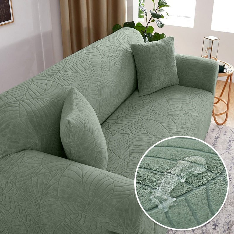 Woonkamer met een strakke jacquard bankhoes die een moderne en luxueuze sfeer creëert.
